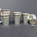 A set of six late 19th / early 20th century French silver shot glasses by Louis Coignet, with