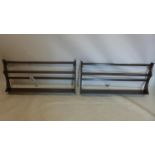 A pair of Ercol mahogany plate racks, H.50 W.98 D.10cm