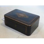 A late 19th / early 20th century ebonised brass inlaid box, with brass vacant cartouche, H.10 W.28