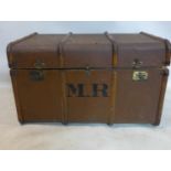 An early 20th century travel trunk with label for 'Denty's Trunk Stores', H.55 W.93 D.57cm