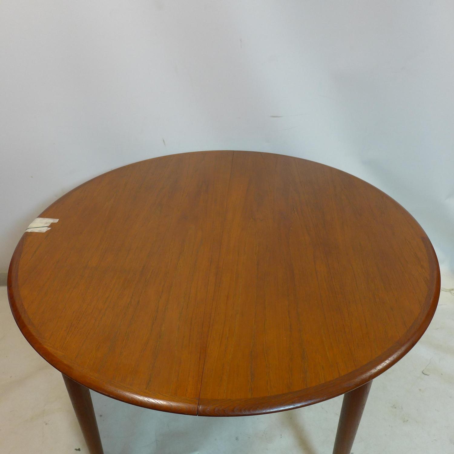 A 20th century teak dining table raised on tapered legs, H.73 D.120cm - Image 2 of 2