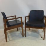 A pair of 20th century teak armchairs stamped Olsen & sons