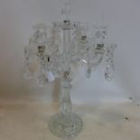 A glass candelabra with glass droplets, H.58cm