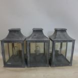 A set of 3 garden wall lights