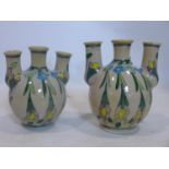 Two Persian vases with three stems, decorated with flowers (3)