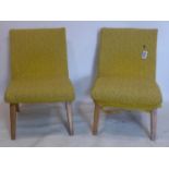 A pair of 20th century cocktail chairs