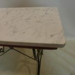 A vintage wrought iron console table with marble top, H.75 W.95 D.47cm