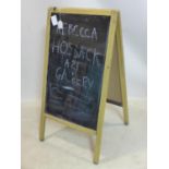 A folding blackboard sign