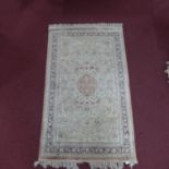 A 20th century fine silk Hereke rug with European design, 156 x 94cm