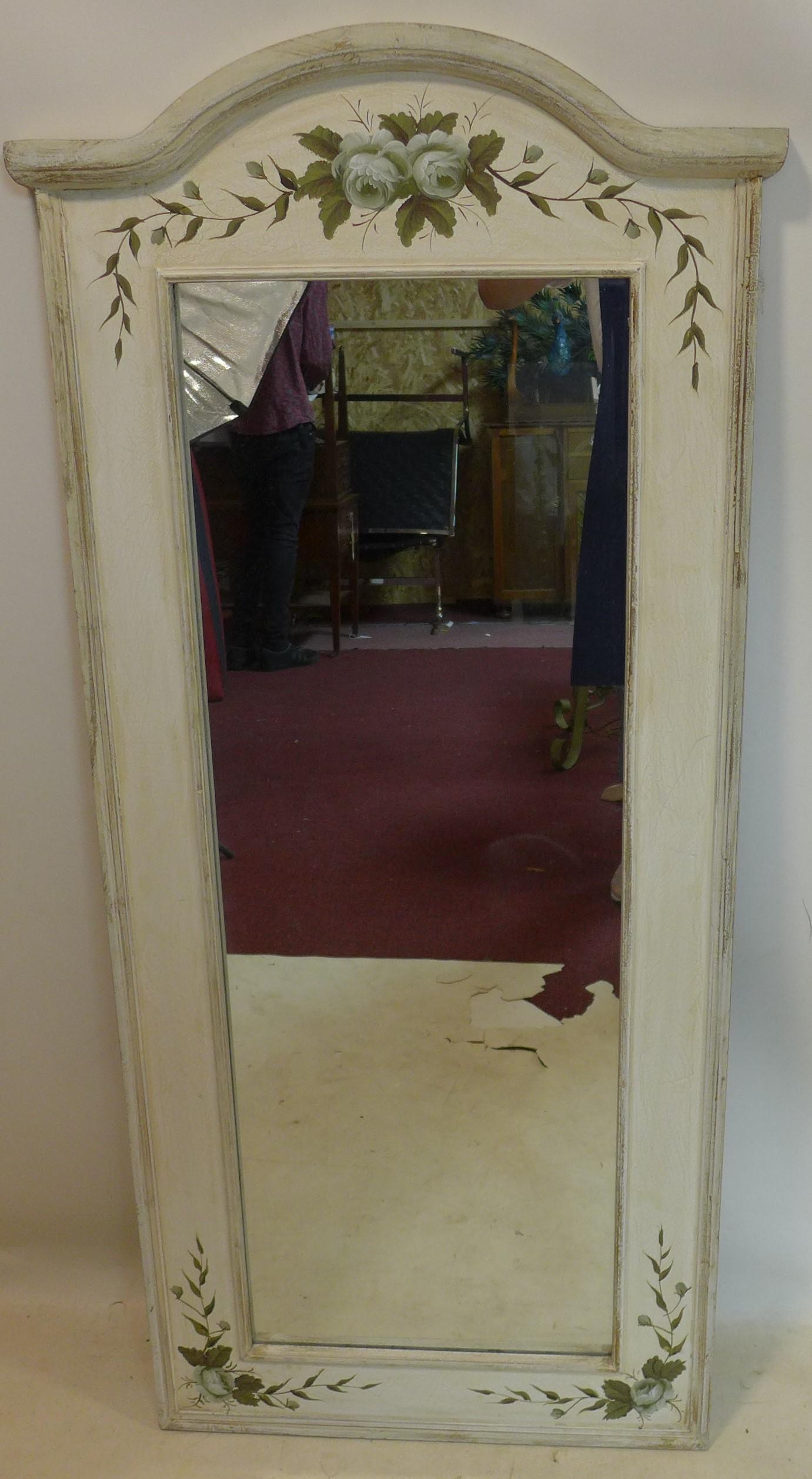 A tall narrow white painted mirror, 135 x 61cm