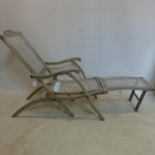 A vintage weather teak steamer sun lounger, with caning