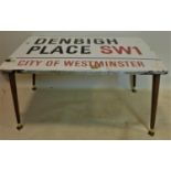 A vintage enamelled London road sign converted to a coffee table