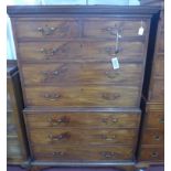 An early 19th century mahogany chest on chest, with 2 short over 6 long graduated drawers, raised on