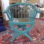 A contemporary Chinese armchair in turquoise and gilded lacquer with caned seat and of x-stretcher