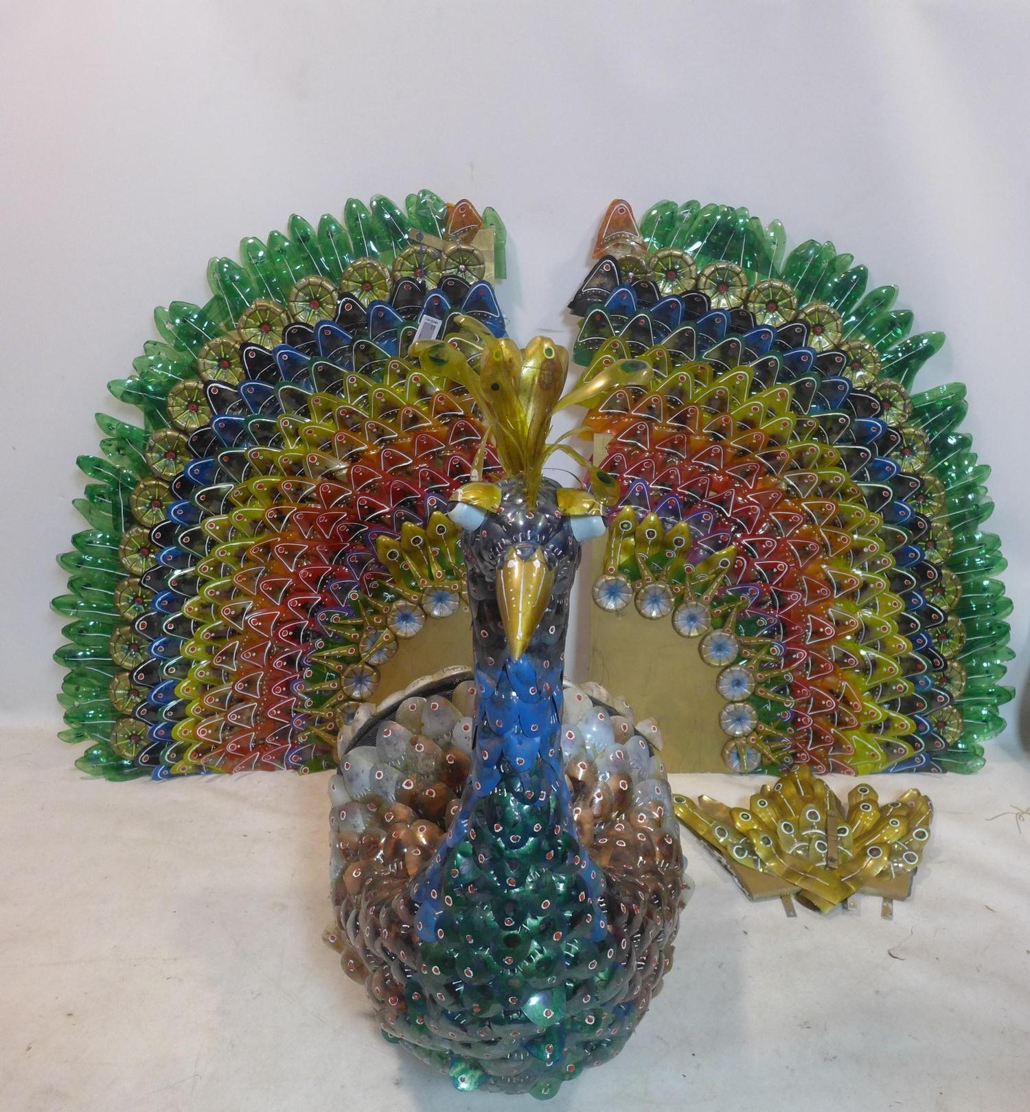 Edgardo Rodriguez (Contemporary artist), a large sculpture of a peacock made from plastic bottles,