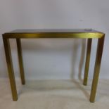 A vintage brass console table with glass top, H.77 W.91 D.35cm