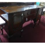 A Queen Anne style walnut sideboard with label for S. Hille & co, H.111 W.183 D.59cm