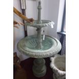 A cast iron two tiered fountain in the verdigris finish, with floral decoration, H.145cm