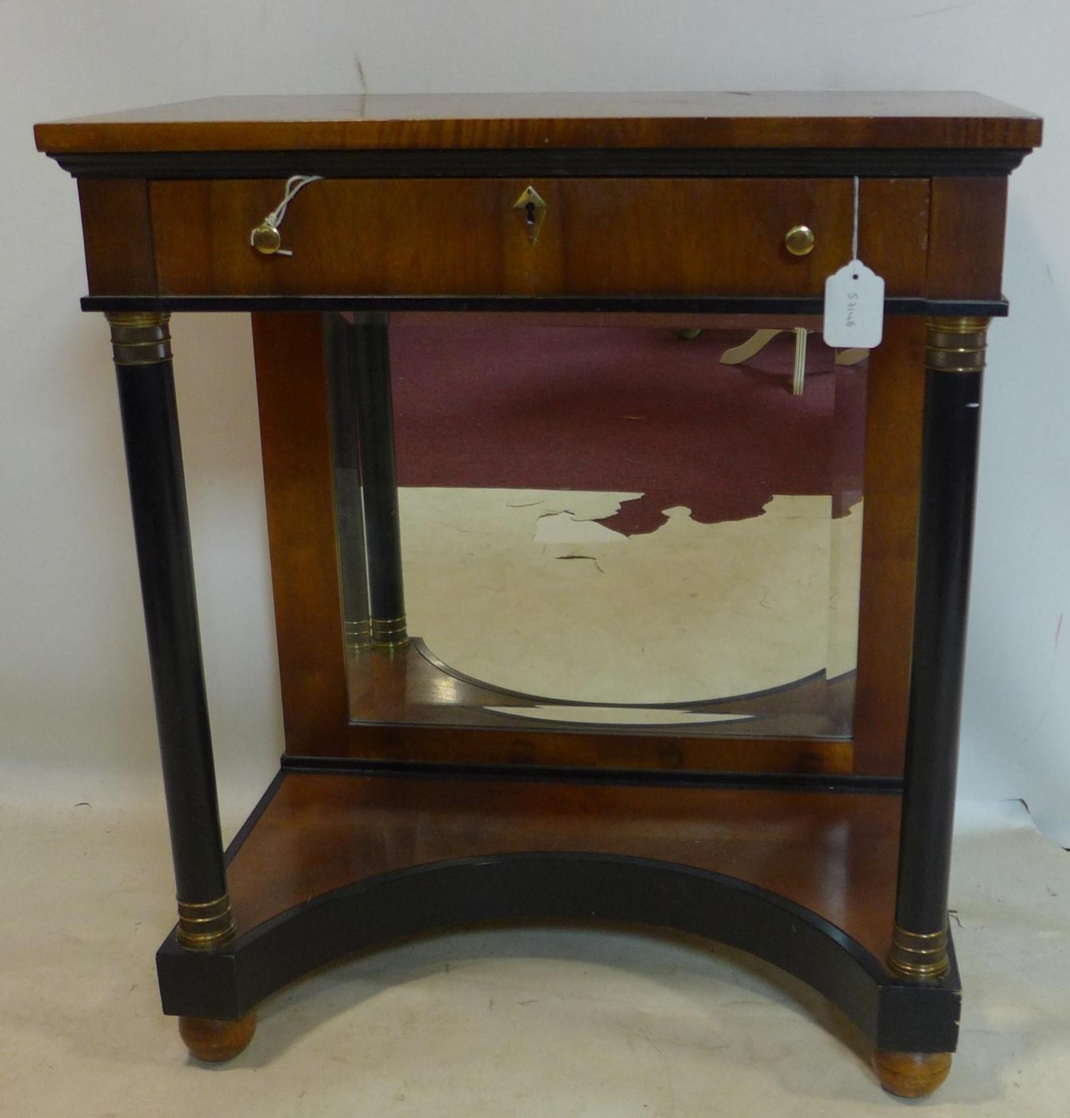 A Biedermeier style part ebonized walnut side table, with single drawer above mirrored back,