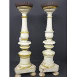 A pair of painted turned pine pricket sticks, H.42cm