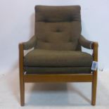 A 20th century teak armchair