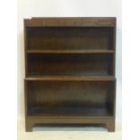 An Art Deco oak open bookcase by Minty, H.113 W.89 D.29cm