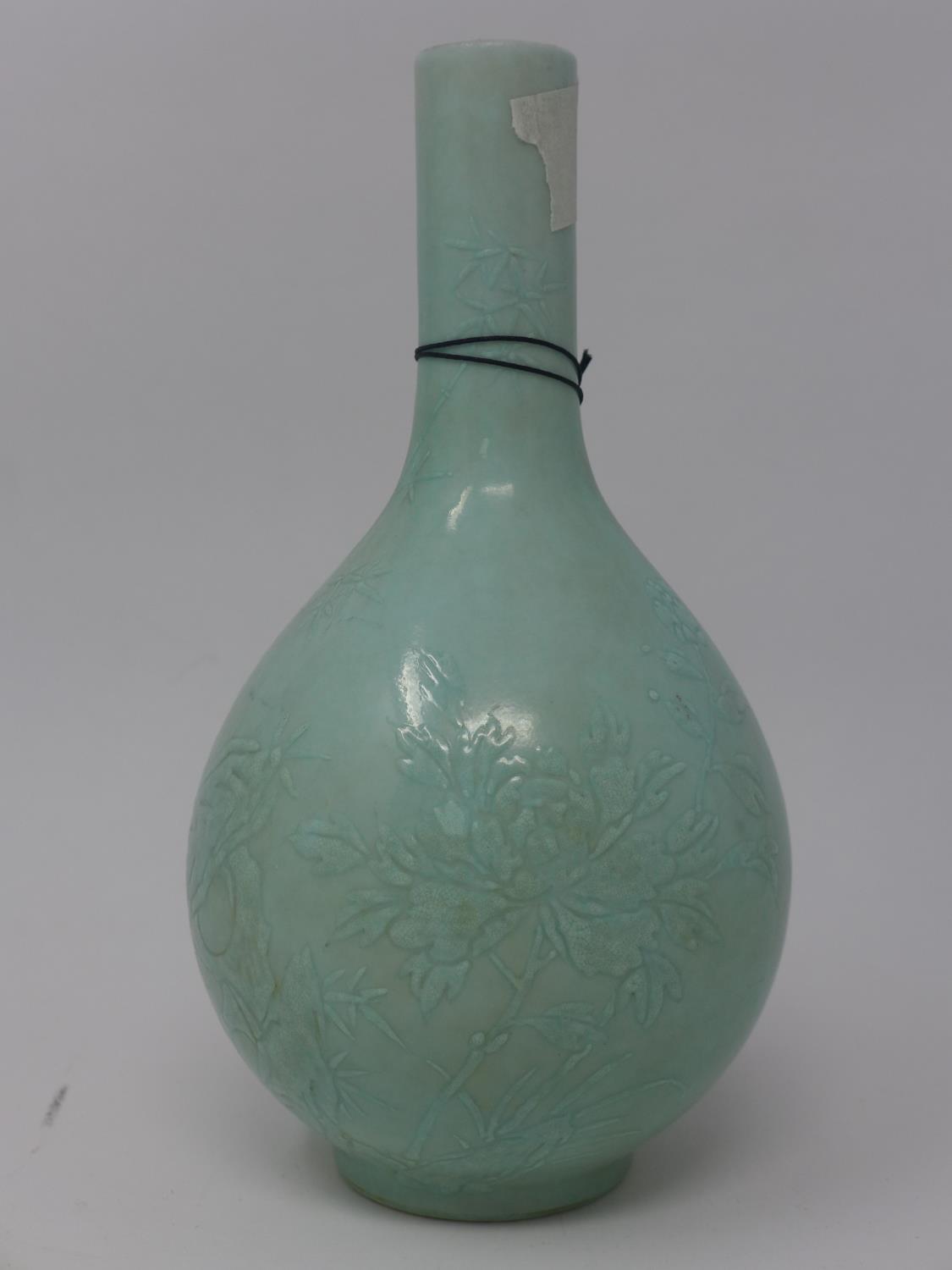 An early 20th century Chinese celadon glazed vase, floral decoration, bearing character marks to - Image 2 of 3