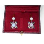 A pair of drop earring set with moonstones, rubies, sapphires and diamonds