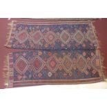 An antique Kilim carpet with geometric design, on a blue ground, split down the middle, 236 x 174cm