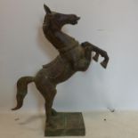 A large early 20th century Indonesian cast bronze study of a horse on hind legs, H.103cm