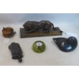 A miscellaneous collection of items to include an antique carving of a lion, antique carving of a