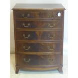 An early 20th century mahogany bow front chest of drawers, raised on splayed feet, H.106 W.80 D.58cm