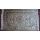 A 20th century Turkish pure silk hereke rug with Aubusson design, 150 x 92cm