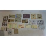 A collection of vintage cigarette cards in sets and albums