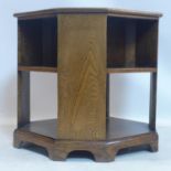 An Art Deco oak coffee table/bookcase, H.56 W.55 D.55cm