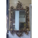 An 18th century style gilt mirror, 105 x 57cm
