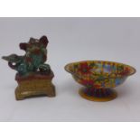 A late 19th century Chinese cloisonne bowl on footed base, together with a glazed stone ware dog