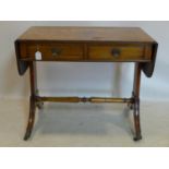 An Edwardian Georgian style mahogany cross-banded sofa table, with 2 drawers, raised on splayed