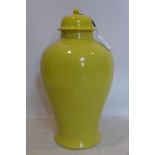 A large Chinese yellow crackle glazed porcelain temple jar and cover, H.61cm