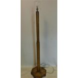 An Art Deco walnut standard lamp