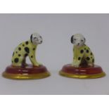 A pair of Chelsea porcelain dogs, with gold anchor mark, H.4cm