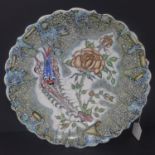 A Turkish ceramic charger with floral design, signed, H.7 D.38cm