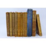 A collection of 11 antique books to include valley of the moon by Jack London, Oliver Twist, the