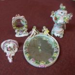 An 18th/19th century Meissen porcelain wall bracket, repaired, together with 2 Meissen style mirrors