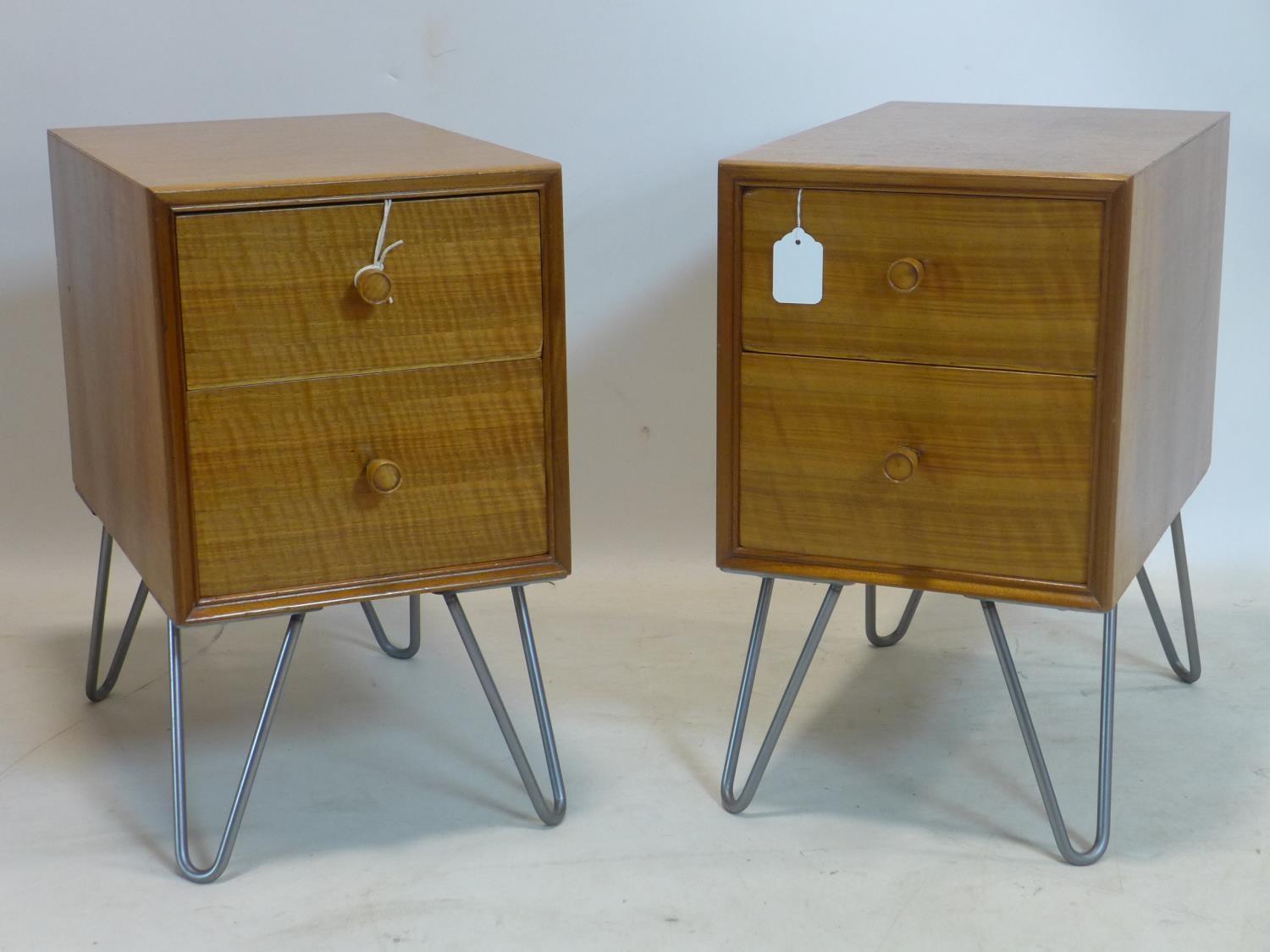 A pair of mid 20th century walnut side chests, raised on hair pin legs, H.52 W.30 D.47cm