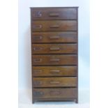 An early 20th century oak pedestal chest of 8 drawers, H.107 W.53 D.37cm