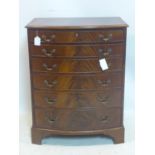 An early 20th century mahogany bow front chest of 6 drawers, raised on bracket feet, H.81 W.64 D.