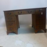 A Georgian style mahogany pedestal desk, H.74 W.121 D.65cm