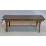 A 20th century Exotic hardwood coffee table, H.36 W.106 D.41cm