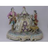 A late 18th/early 19th century Chelsea porcelain figural group, with gold anchor mark to verso,